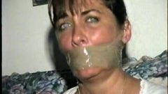 Blue Eyed Milf Tied Up And Wraparound Tapegagged