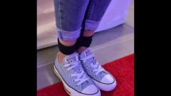 Female With Blue Converse And Tight Jeans Tied Up By Rope